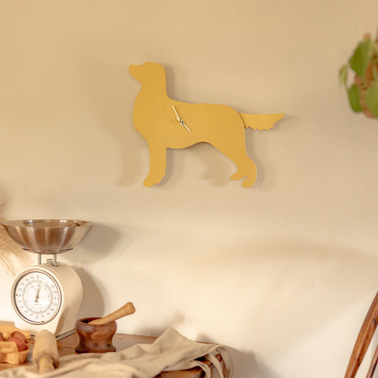 Retriever-klok met kwispelende staart - Gouden