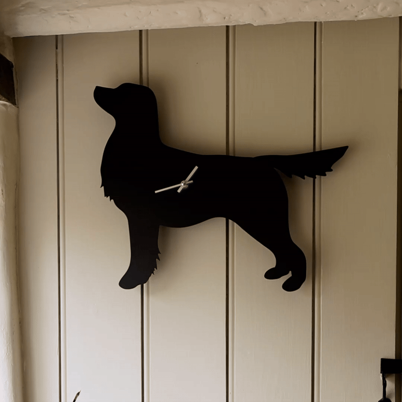 Retriever-klok met kwispelende staart - Zwart