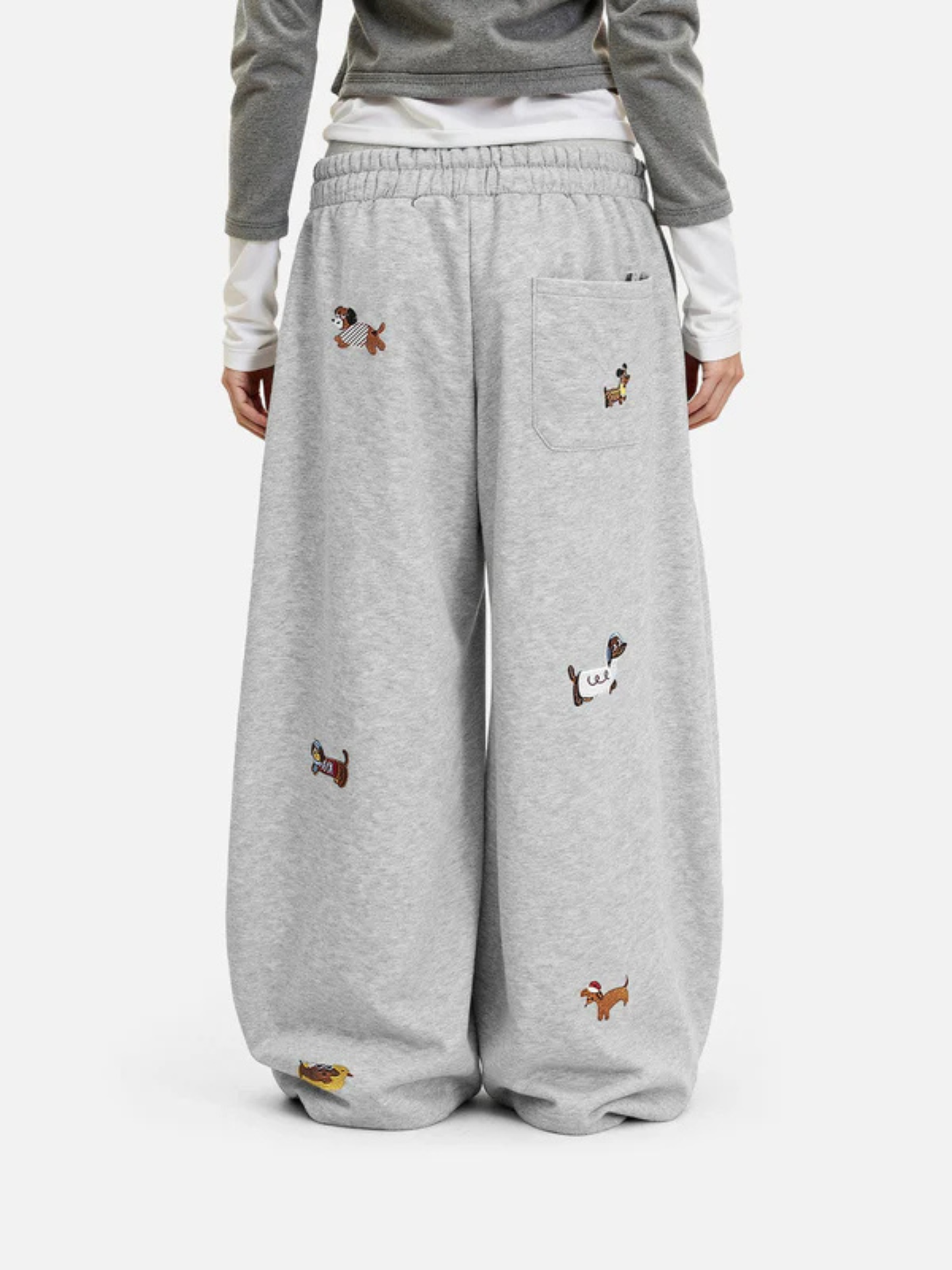Mooibelle geborduurde joggingbroek met puppy-print