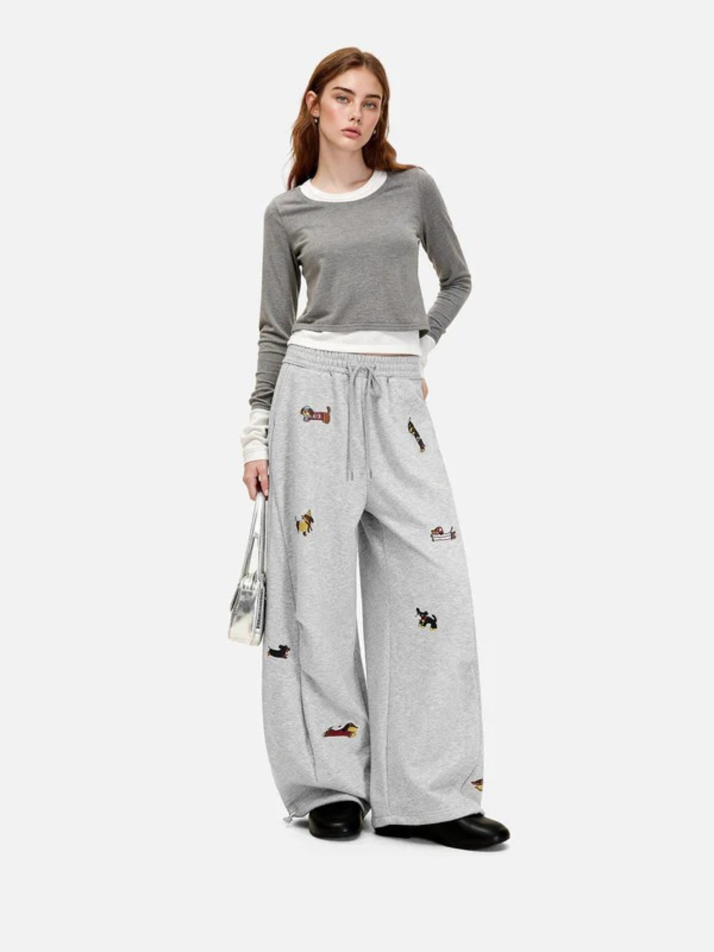 Mooibelle geborduurde joggingbroek met puppy-print